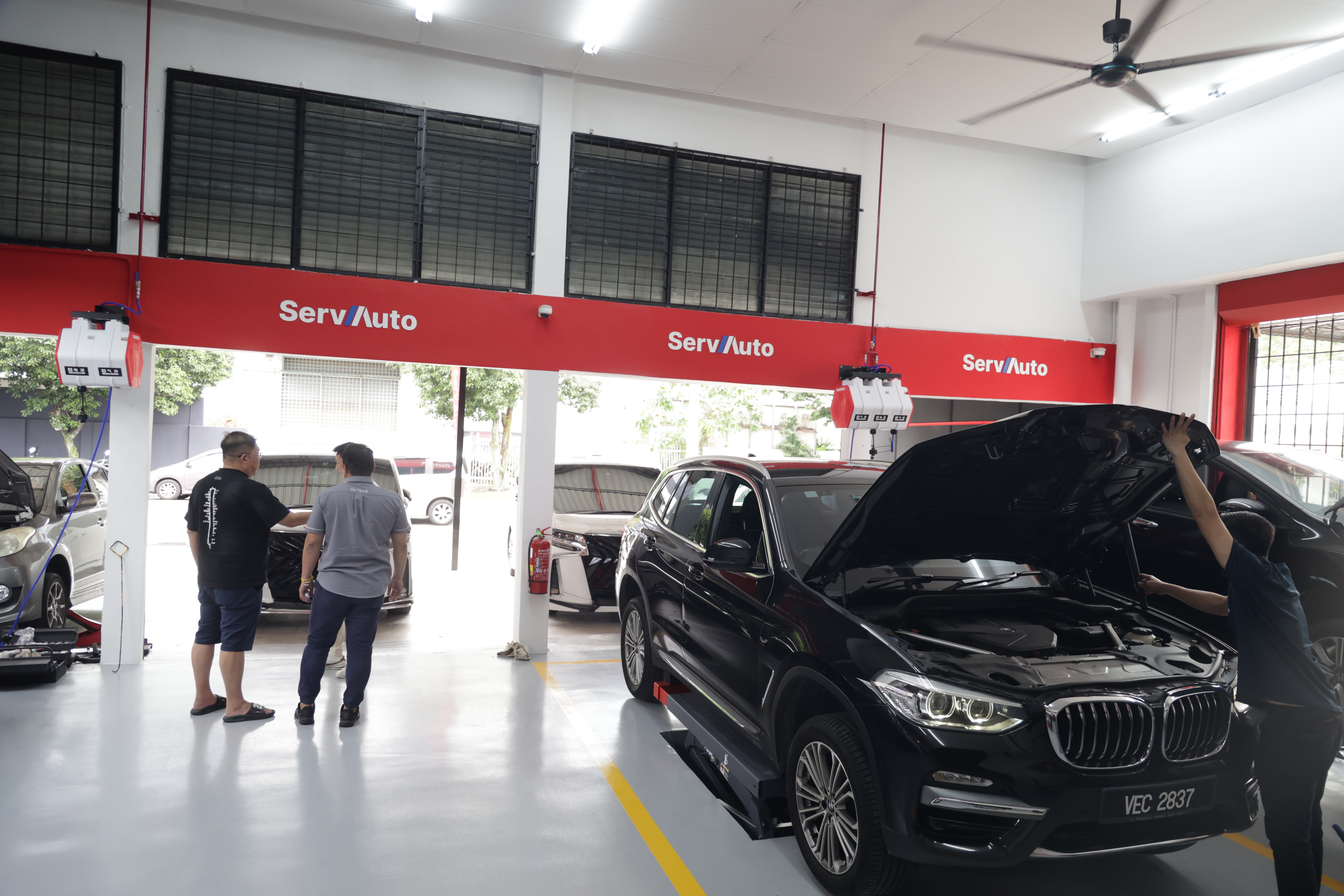 ServAuto service bays with car being serviced